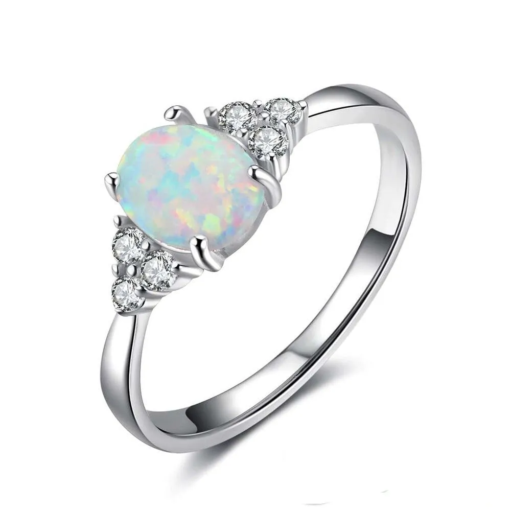 Classic Wedding Ring With Oval Opal Stone