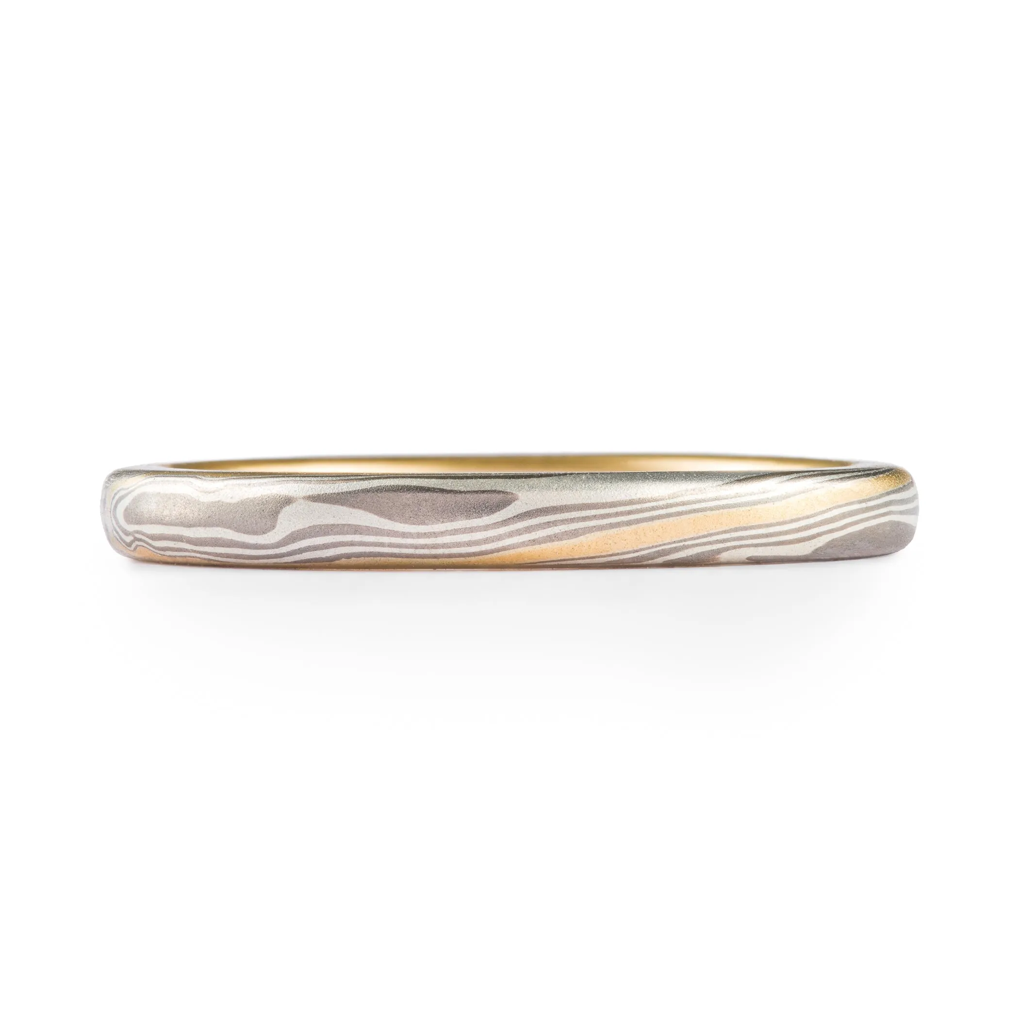 Delicate Gold Stratum Ring in Twist Pattern