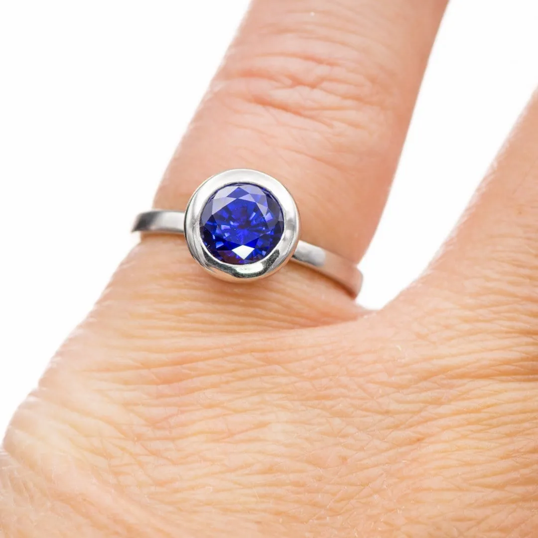 Minimal Round Chatham Blue Sapphire Wide Bezel Solitaire Engagement Ring