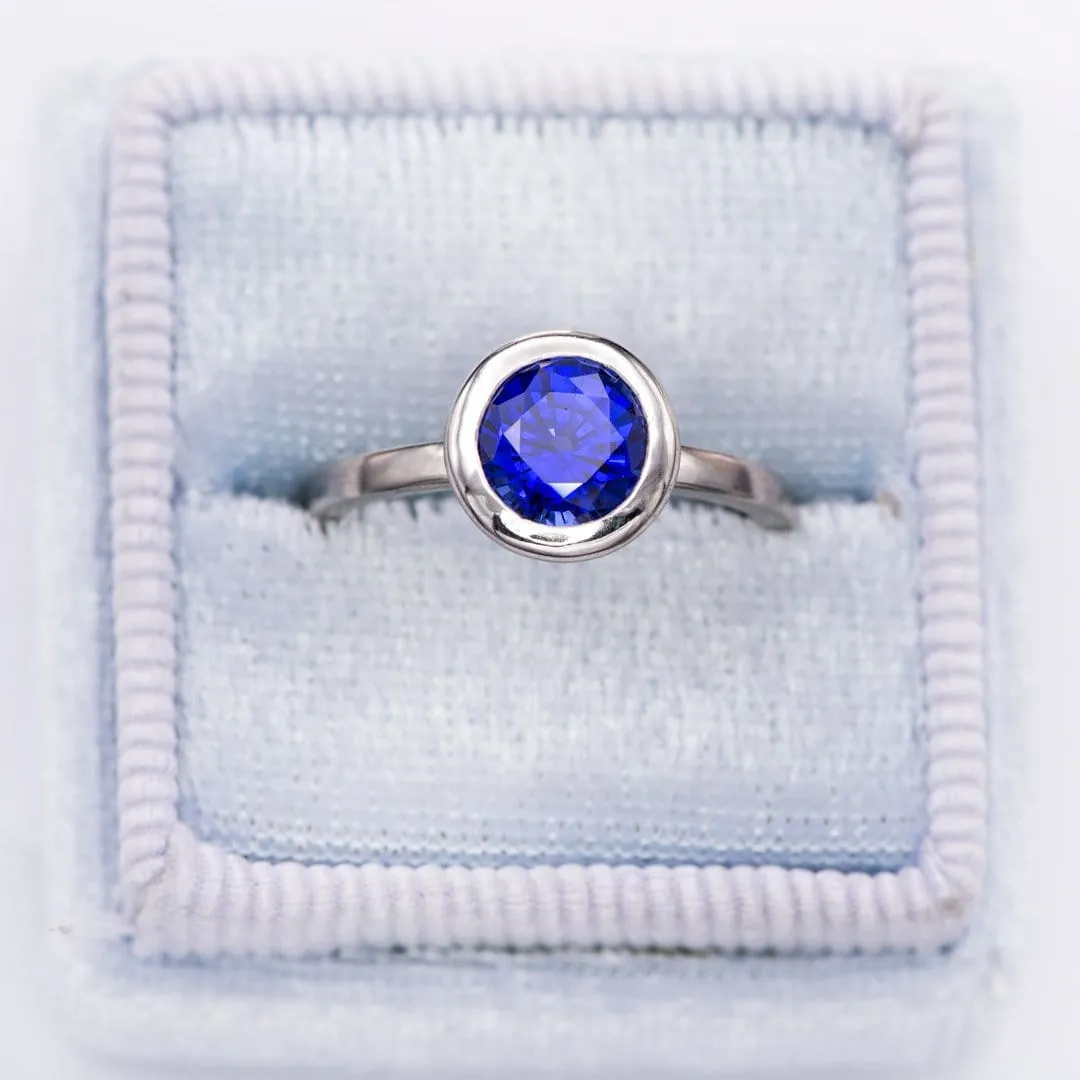 Minimal Round Chatham Blue Sapphire Wide Bezel Solitaire Engagement Ring